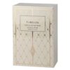 ROMCOM Flaweless Long-Lasting Makeup Set in elegant gold packaging displayed on a white background.